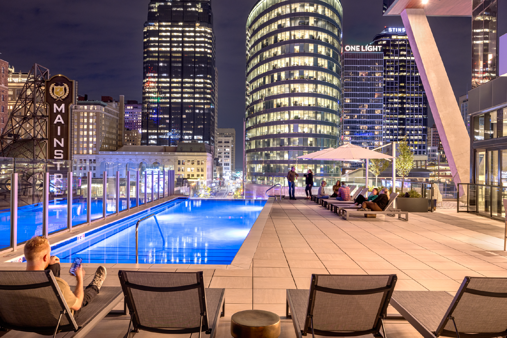 The Pool at Three Light Luxury Apartments at night.