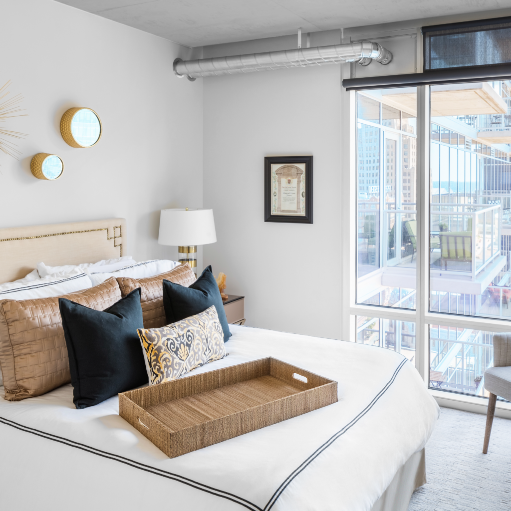 A bedroom at Two Light Luxury Apartments in Kansas City, Missouri.